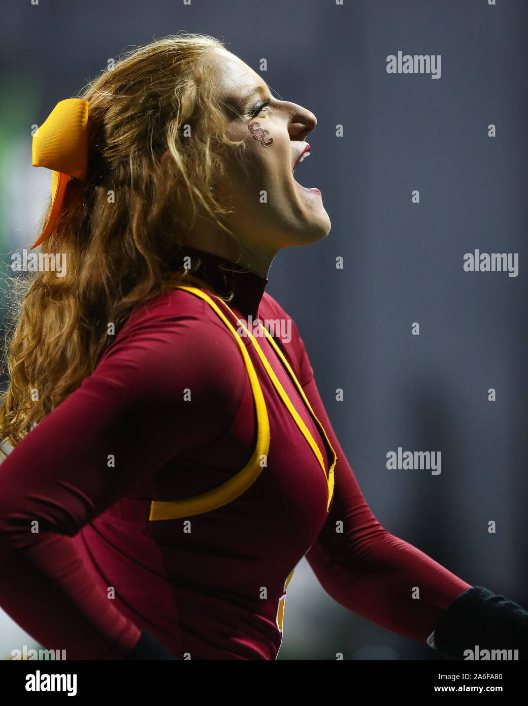 October 25, 2019: A USC cheerleader urges on some of her fans in the second half of the game between Colorado and USC at Folsom Field in Boulder, CO. USC rallied to win 35-31. Derek Regensburger/CSM. Credit: Cal Sport Media/Alamy Live News Credit: Cal Sport Media/Alamy Live News Credit: Cal Sport Media/Alamy Live News Stock Photo