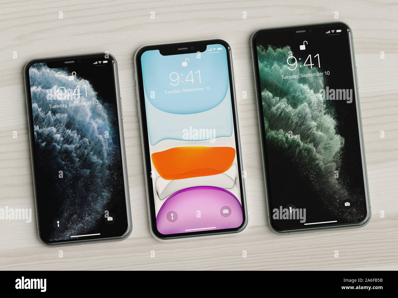 ITALY -22 SEPTEMBER, 2019: Iphone 11, 11 Pro and 11 Max smartphones on table. Latest Apple Mobile iphones model. Illustrative editorial. Stock Photo