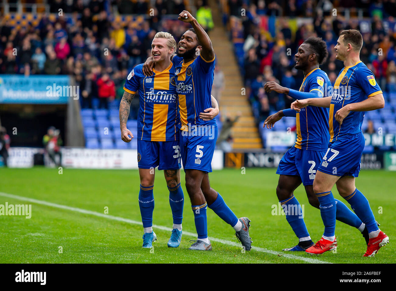 SHREWSBURY, ENGLAND OCTOBER 26TH Jason Cummings of Shrewsbury Town celebrates with Ro-Shaun Williams, Aaron Pierre and Donald Love after scoring the opening goal during the Shrewsbury Town and Sunderland at Montgomery Meadow, Shrewsbury on Saturday 26th October 2019. (Credit: Alan Hayward | MI News) Photograph may only be used for newspaper and/or magazine editorial purposes, license required for commercial use Credit: MI News & Sport /Alamy Live News Credit: MI News & Sport /Alamy Live News Stock Photo