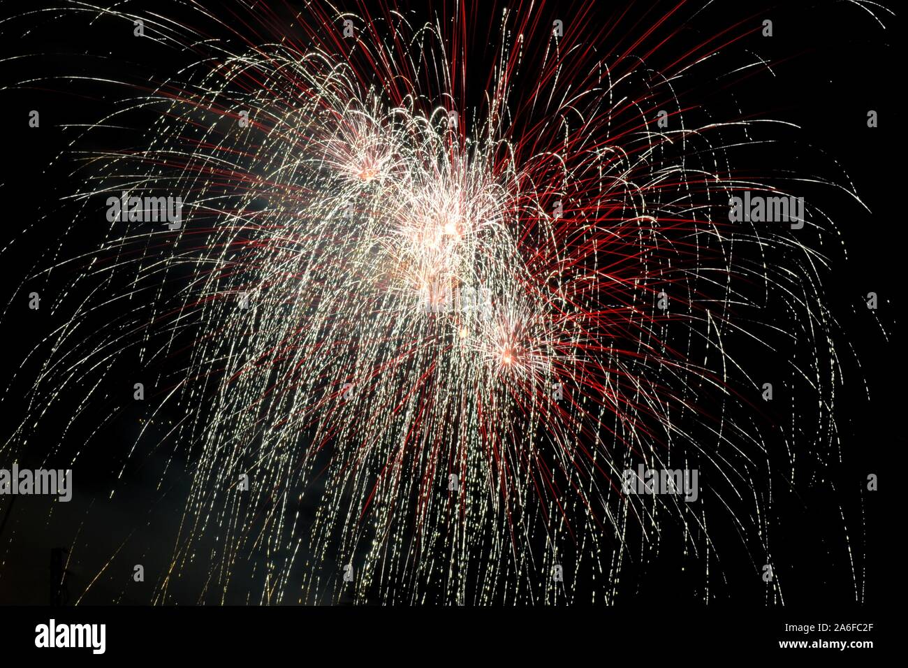 Great fireworks in the dark night sky Stock Photo