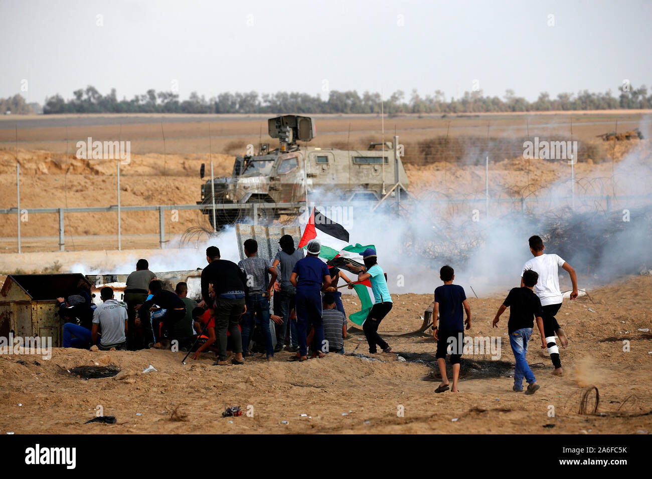 Palestinians take part in a demonstration, on the Gaza-Israel border, in east of Rafah in the southern Gaza Strip, on Oct 25, 2019. Stock Photo