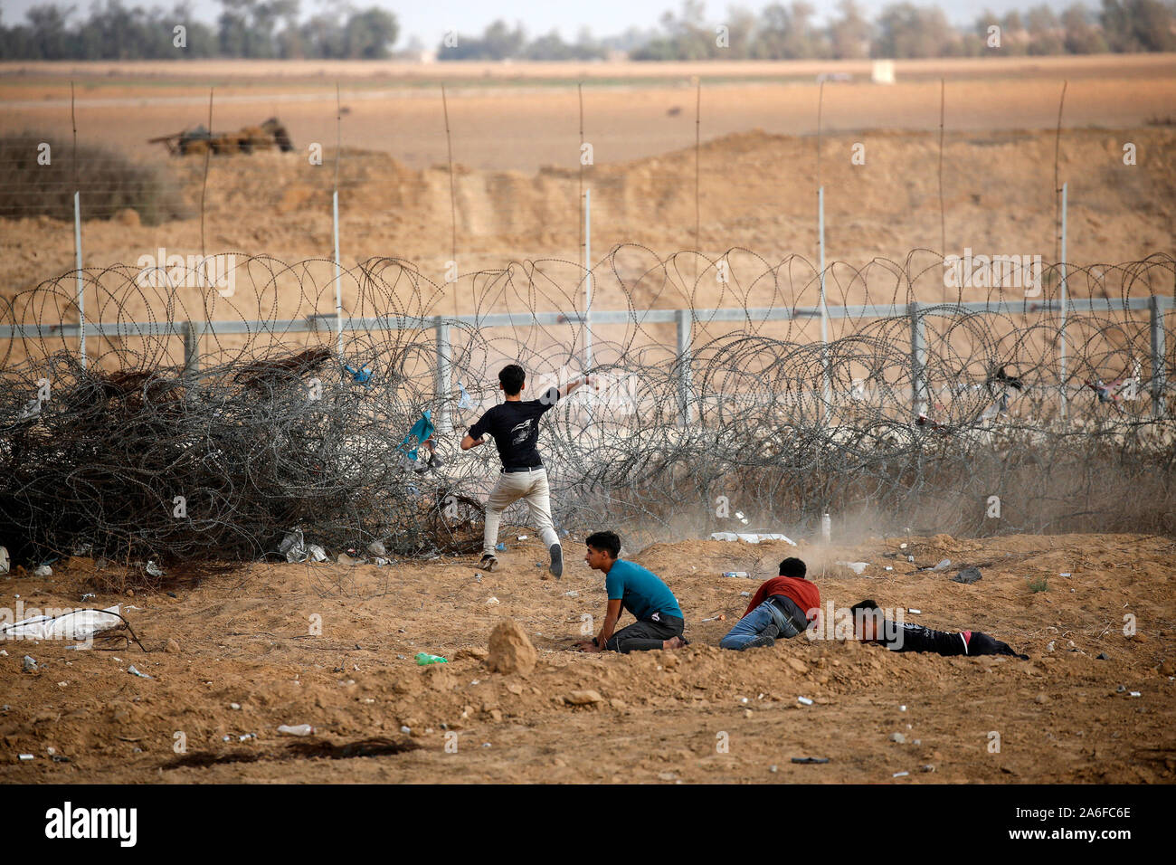 Palestinians take part in a demonstration, on the Gaza-Israel border, in east of Rafah in the southern Gaza Strip, on Oct 25, 2019. Stock Photo