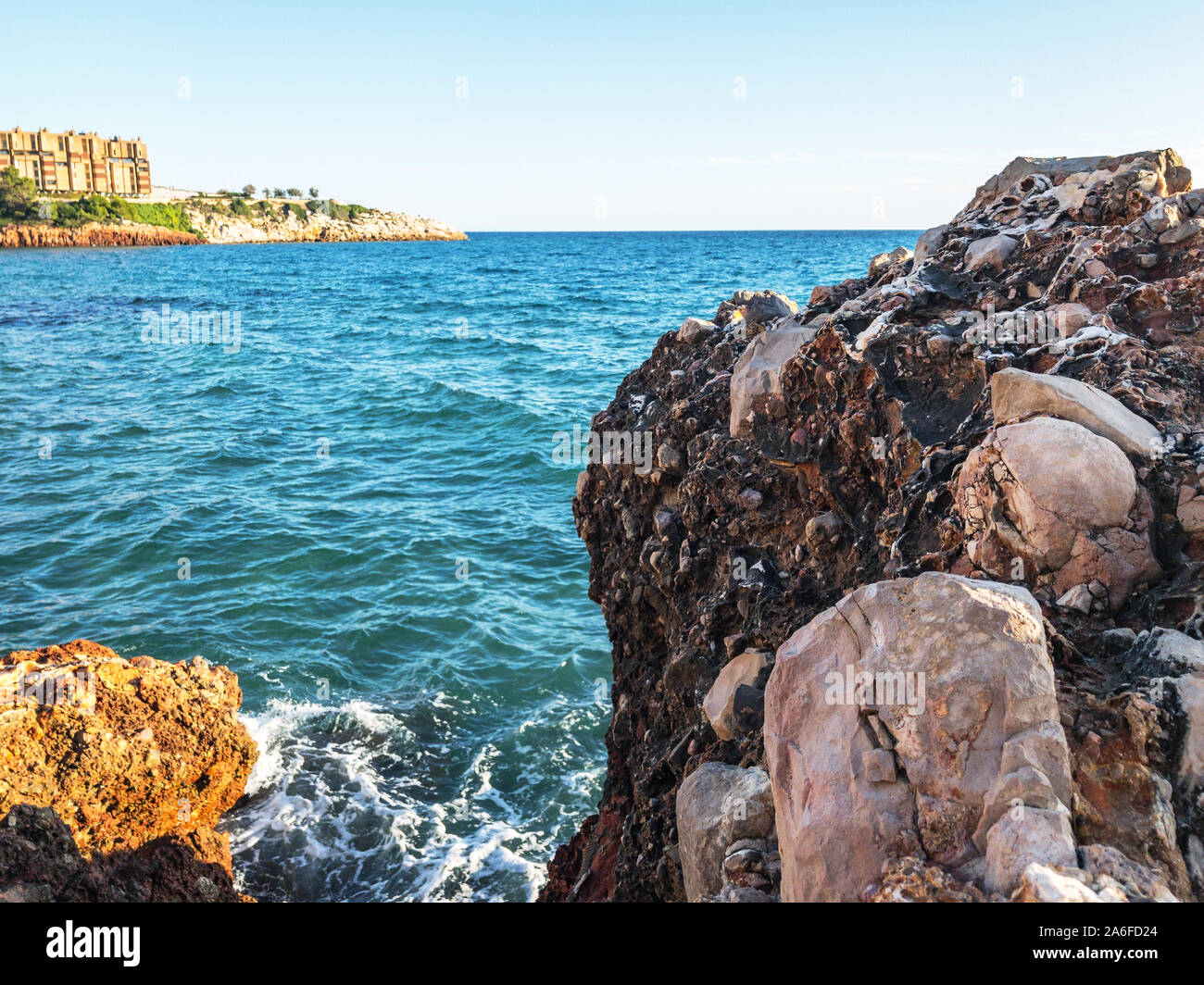 Blue sea waves rocky beach hi-res stock photography and images - Alamy