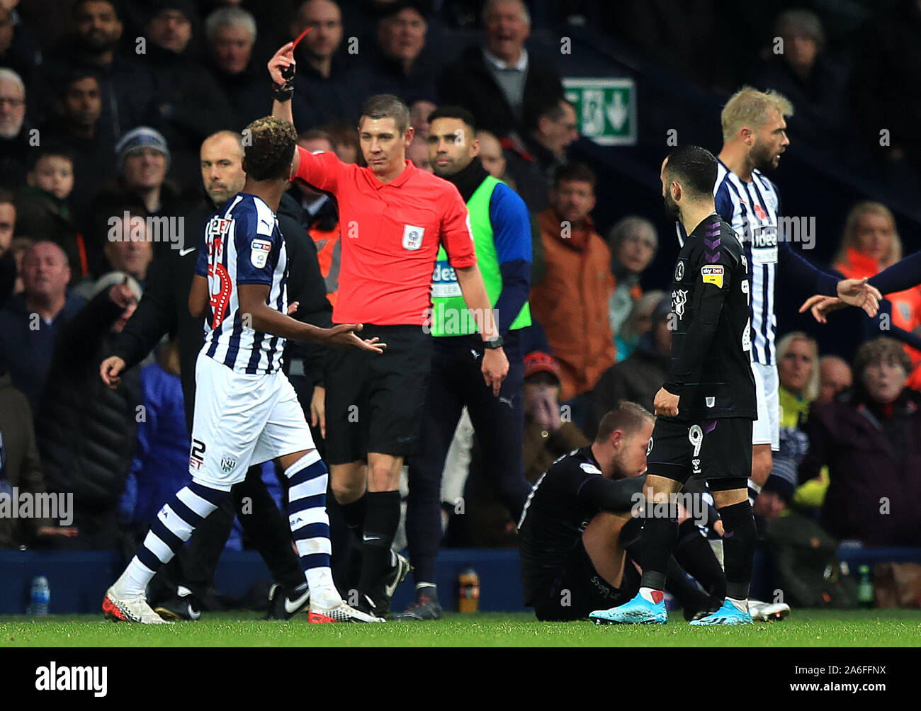 Match Referee Matthew Donohue Incorrectly Issues A Red Card To West Bromwich Albion S Grady Diangana Centre Before Correcting His Decision To Nathan Ferguson Not Pictured During The Sky Bet Championship Match At