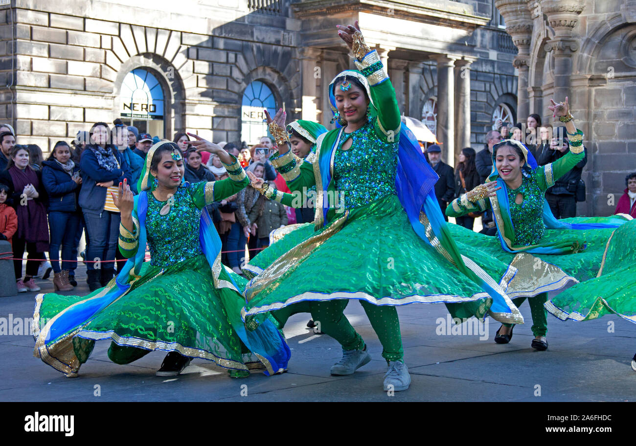 Edinburgh, Scotland, UK. 26th October 2019. The Diwali Parade marches through the city streets culminating in a celebration of theatre, dance and music in Princes Street Gardens. Diwali will light up the city with a dazzling parade and festival of lights dance and music, in Princes Street Gardens West, The Festival of Diwali is celebrated by Hindus, Jains, Sikhs and Buddhists around the world, each religion marking different historical events and legends, however all represent the victory of light over darkness, good over evil and hope over despair. Stock Photo