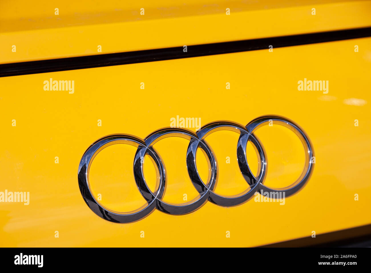 Russia Moscow 2019-06-17 The emblem on the back of a Audi TT S Line brand  logo on yellow car Stock Photo - Alamy