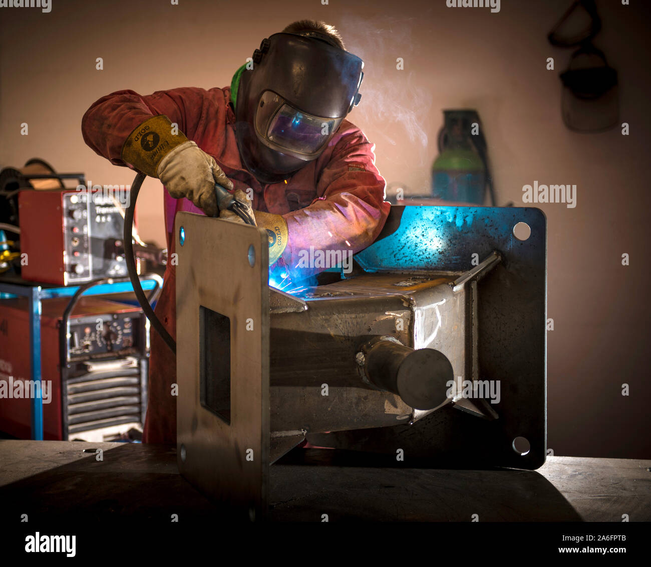 An engineer MIG Welding a bespoke steel fabrication in the workshop Stock  Photo - Alamy
