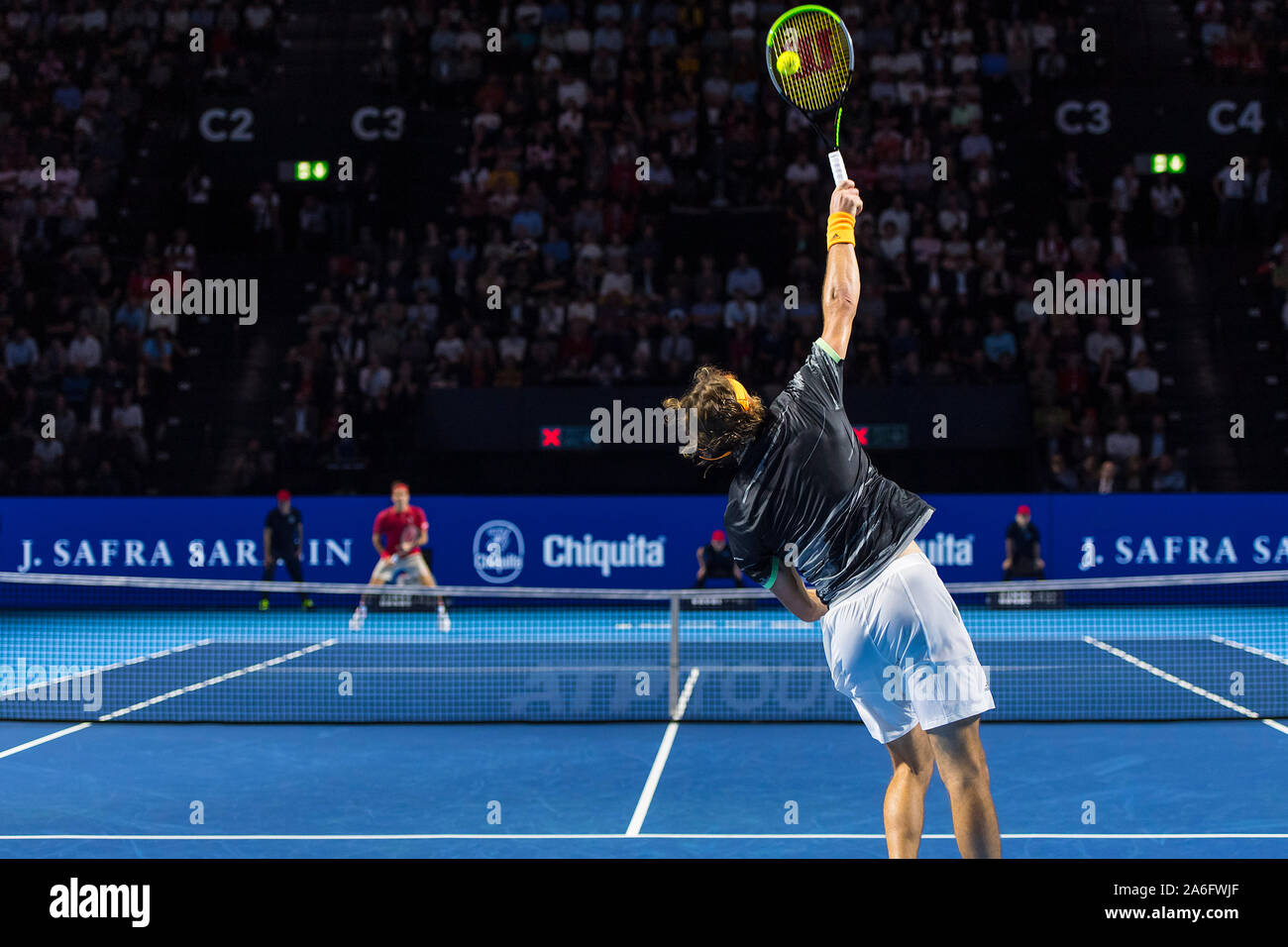 St. Jakobshalle, Basel, Switzerland. 26th Oct, 2019. ATP World Tour Tennis,  Swiss Indoors; Stefanos Tsitsipas (GRE) serves the ball in the match  against Roger Federer (SUI) - Editorial Use Credit: Action Plus