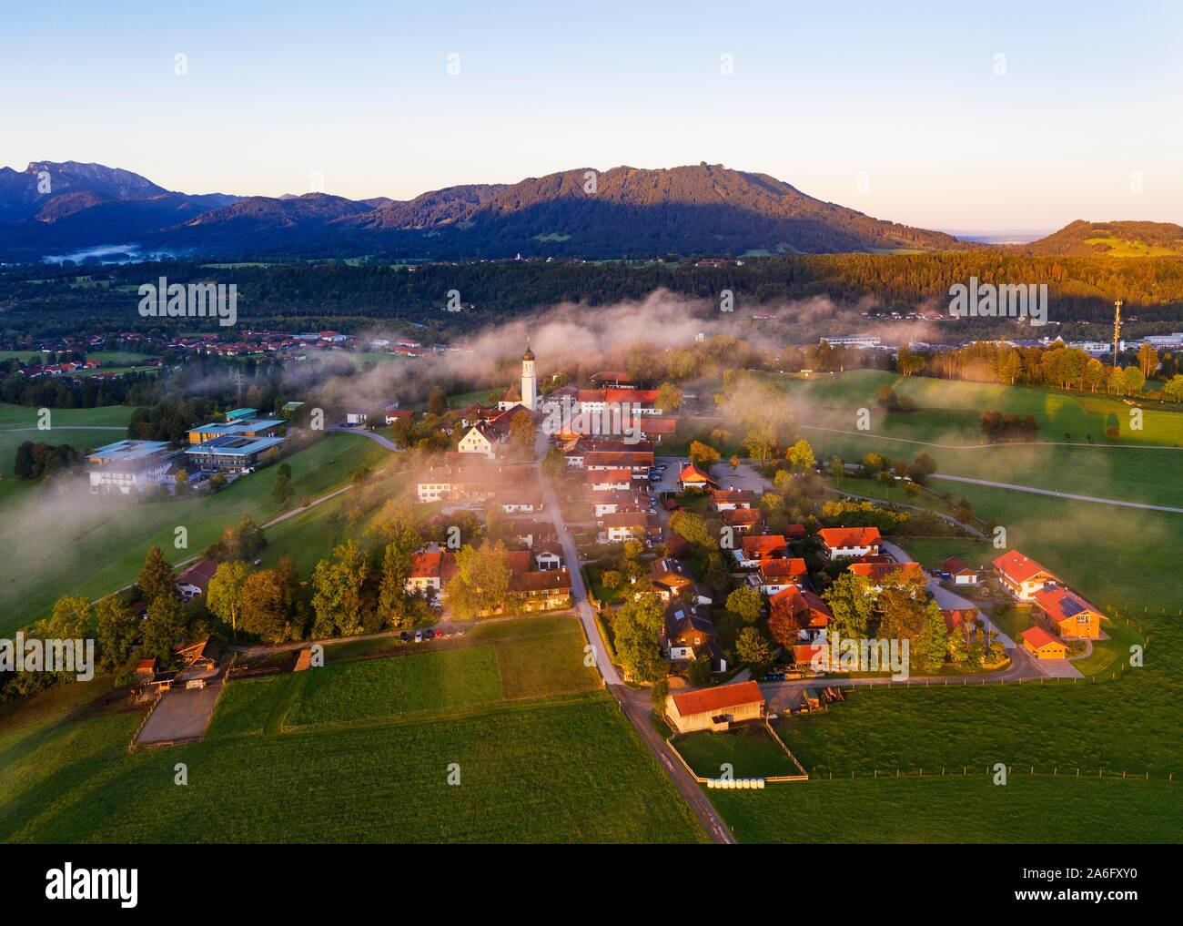 Gaissach in the morning light, behind Heigelkopf, Isarwinkel, aerial view, Upper Bavaria, Bavaria, Germany Stock Photo