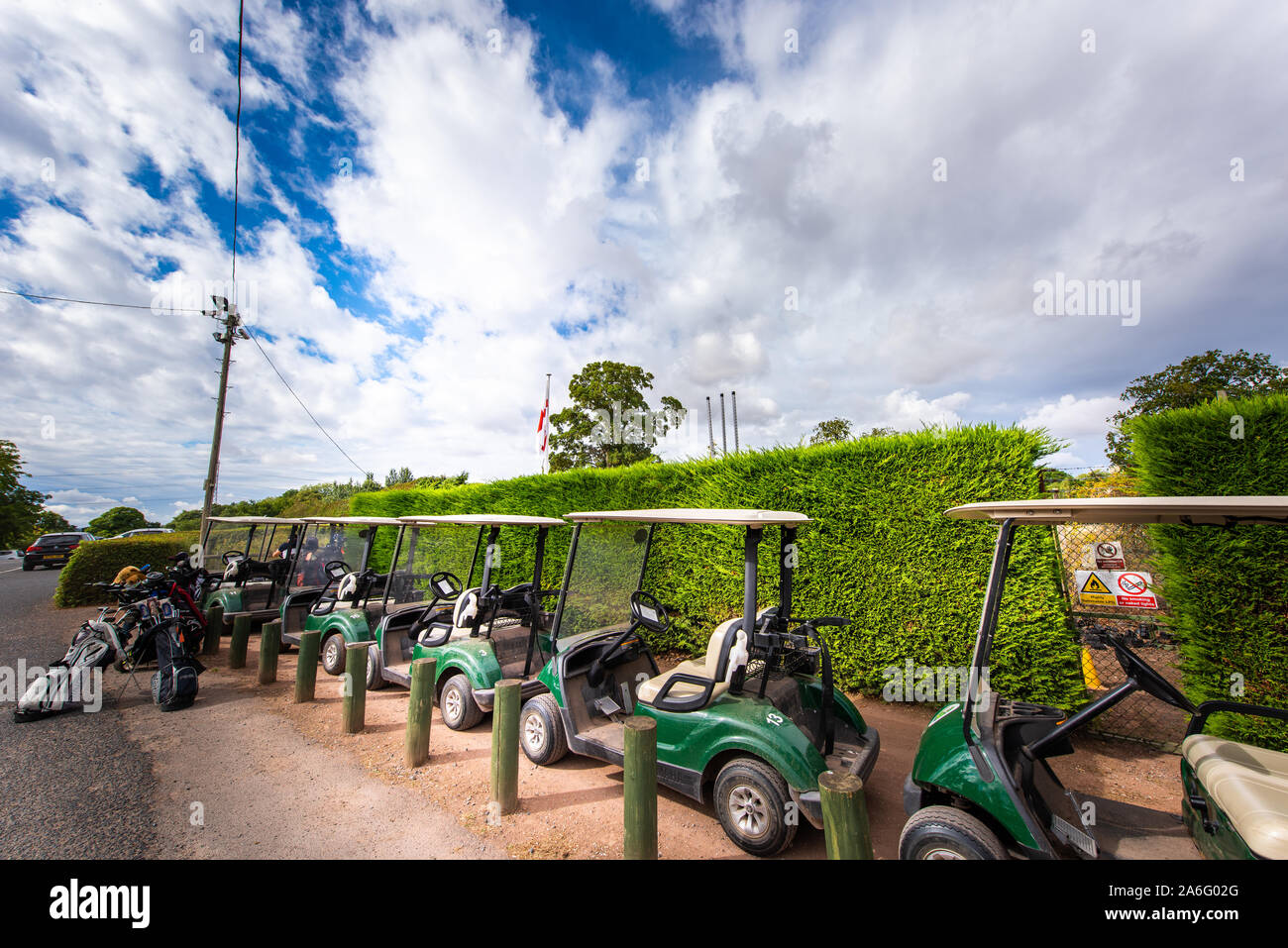 Golf carts ready for golfers to ride around the course at Patshull golf ...