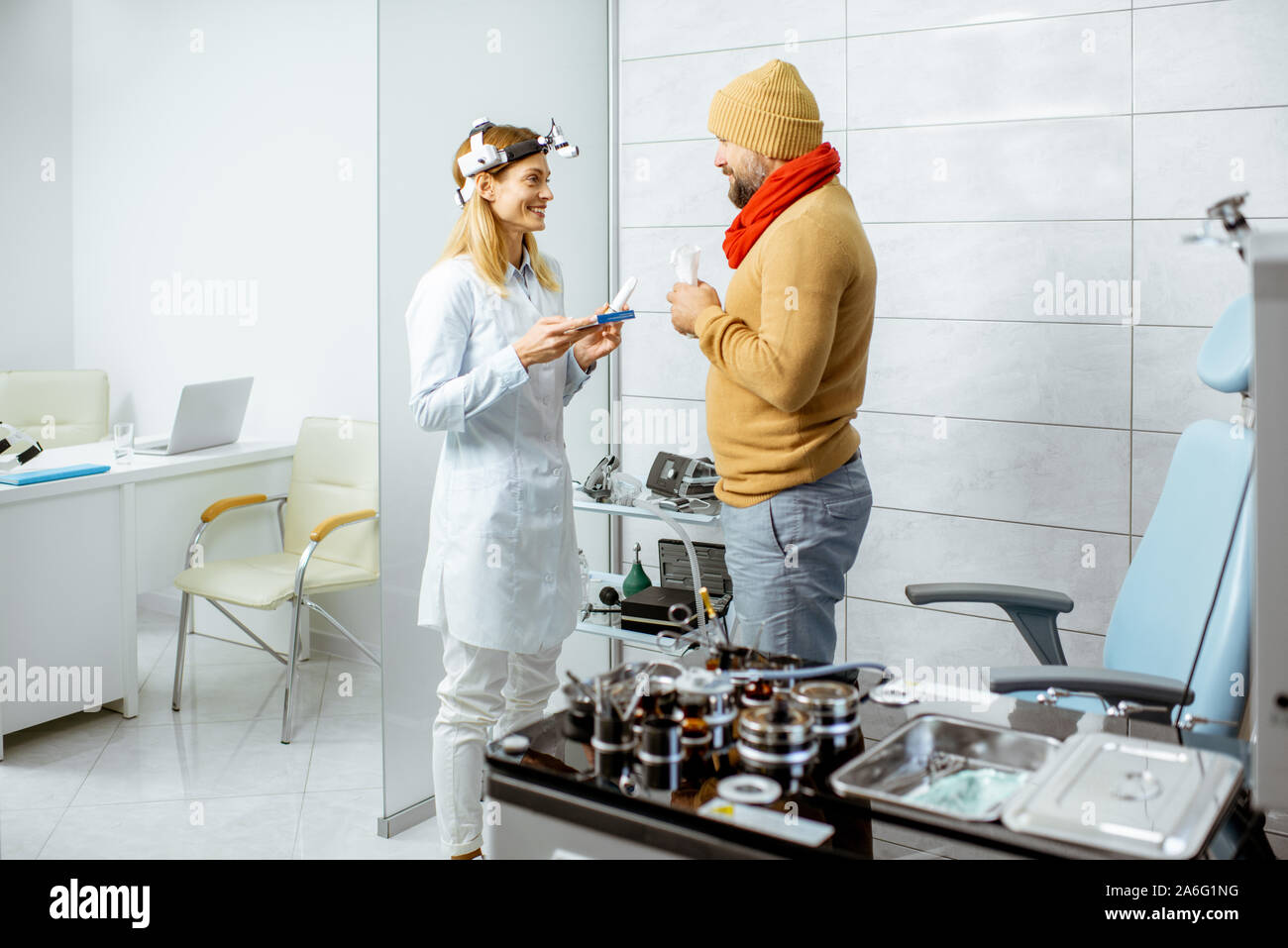 Sick patient in warm clothes with runny nose during a medical