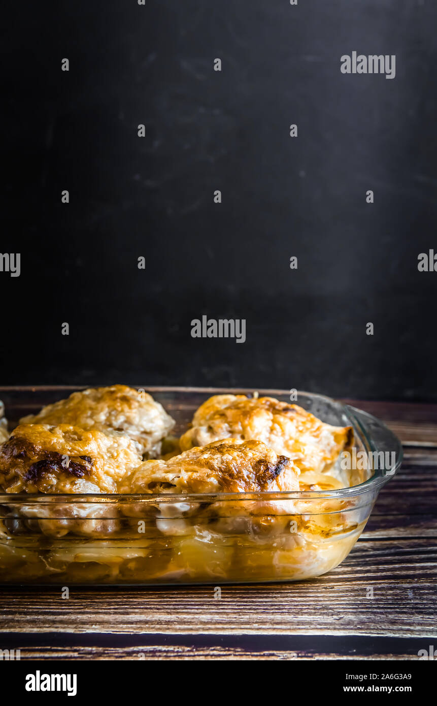 food. baked chicken with potatoes. fatt Cholesterol. copy space Stock