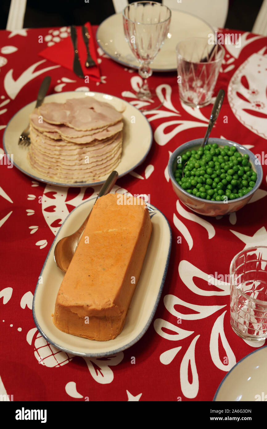Christmas table from Finland. There is green peas, Christmas ham and same pate in this photo. Other Scandinavian traditional Christmas foods! Stock Photo