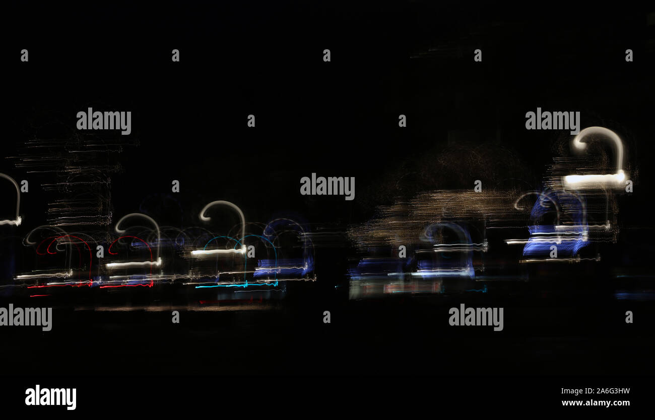City of Helsinki, Finland during holiday season. Plenty of colorful lights in motion. Long exposure photo creating beautiful lights with movement. Stock Photo
