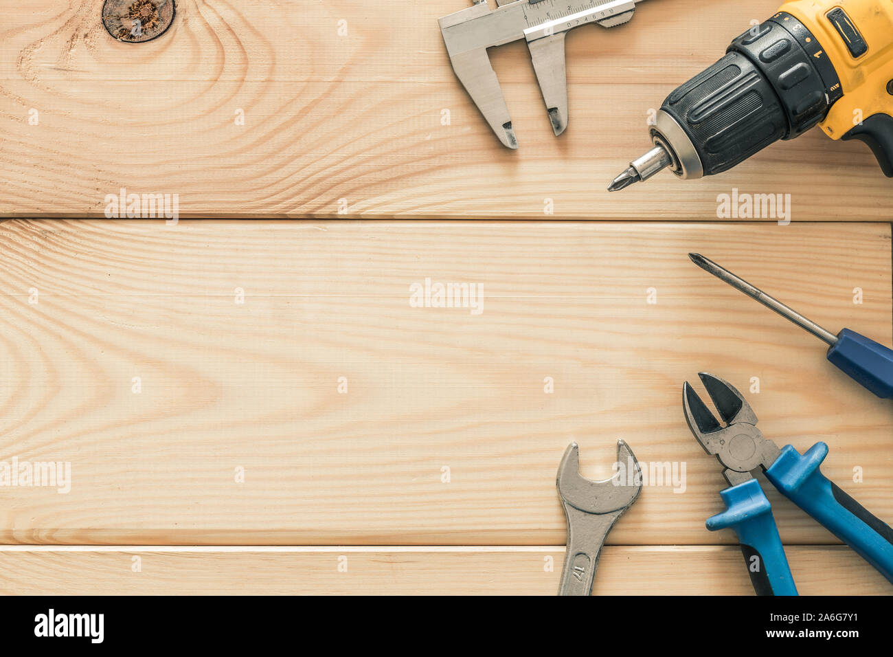 Workshop tools on a wooden board Stock Photo