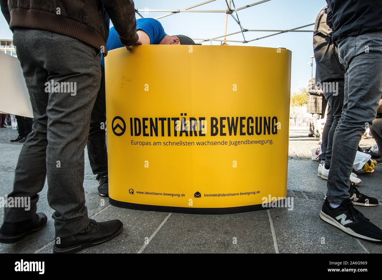 Munich, Germany.  October 26, 2019, Munich, Bavaria, Germany: Logo of the Identitaere Bewegung, also known as Generation Identity. Amid protests, the right-extremist, nationalist, voelkisch Identitaere Bewegung (Generation Identity, Identitiaeren Movement) held a rally at Munich's Stachus. The Identitaere have recently faced numerous challenges, including raids to explore the connection of its head Martin Sellner to the Christ Church shooter, as well as in Germany where the IB was officially classified as 'right-extremist''. The group has renewed the use of the 'blood and soil'' (Blut Stock Photo