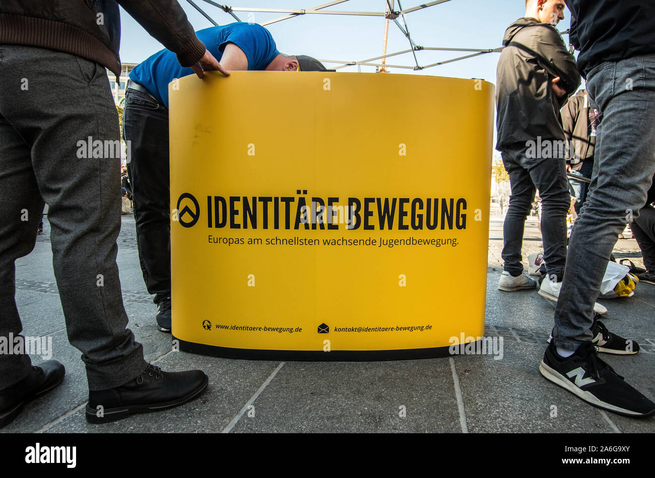 Munich, Germany. October 26, 2019, Munich, Bavaria, Germany: Logo of the Identitaere Bewegung, also known as Generation Identity. Amid protests, the right-extremist, nationalist, voelkisch Identitaere Bewegung (Generation Identity, Identitiaeren Movement) held a rally at Munich's Stachus. The Identitaere have recently faced numerous challenges, including raids to explore the connection of its head Martin Sellner to the Christ Church shooter, as well as in Germany where the IB was officially classified as 'right-extremist''. The group has renewed the use of the 'blood and soil'' (Blut Stock Photo