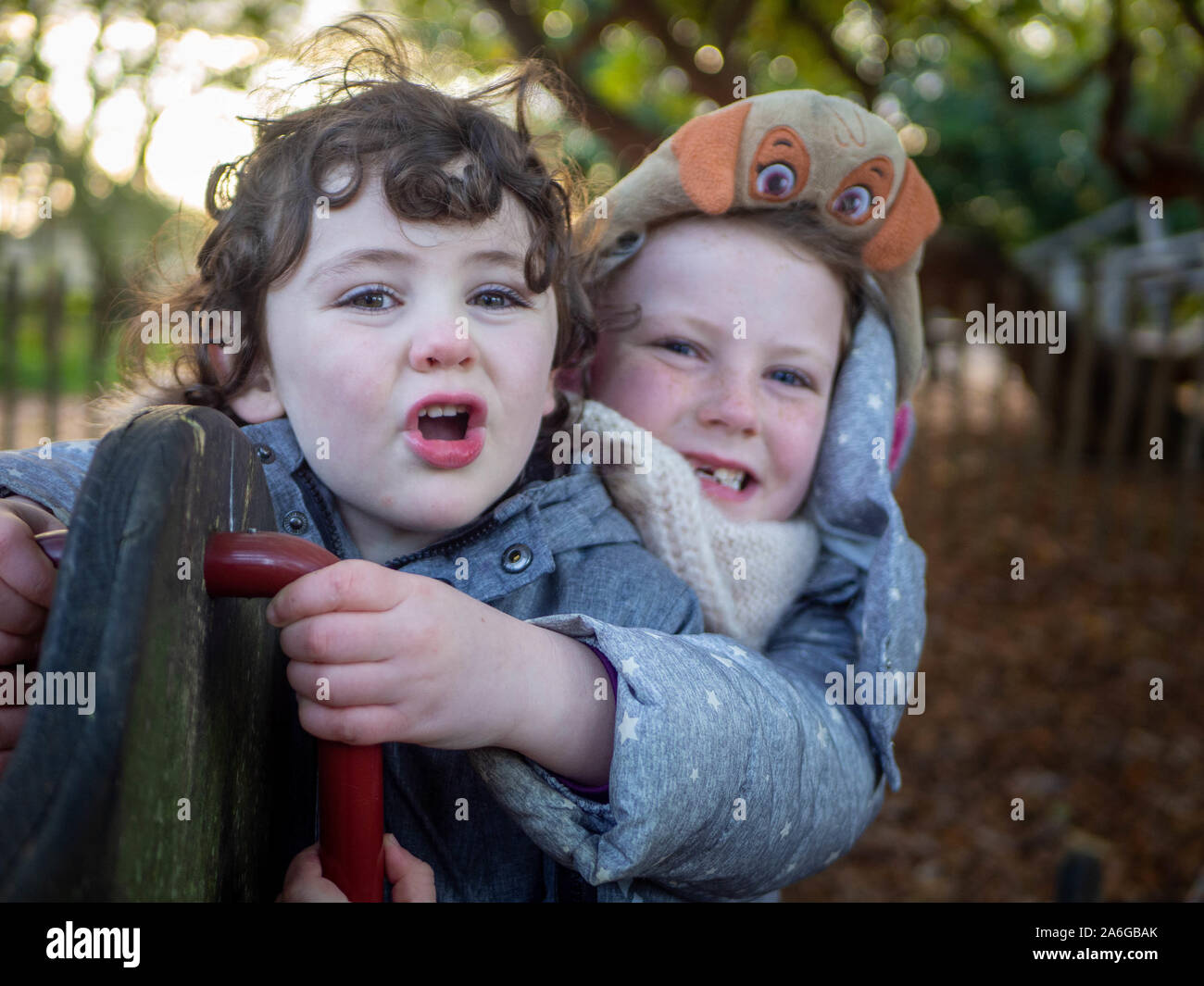 kids playing at the park, cumbria lake district Stock Photo