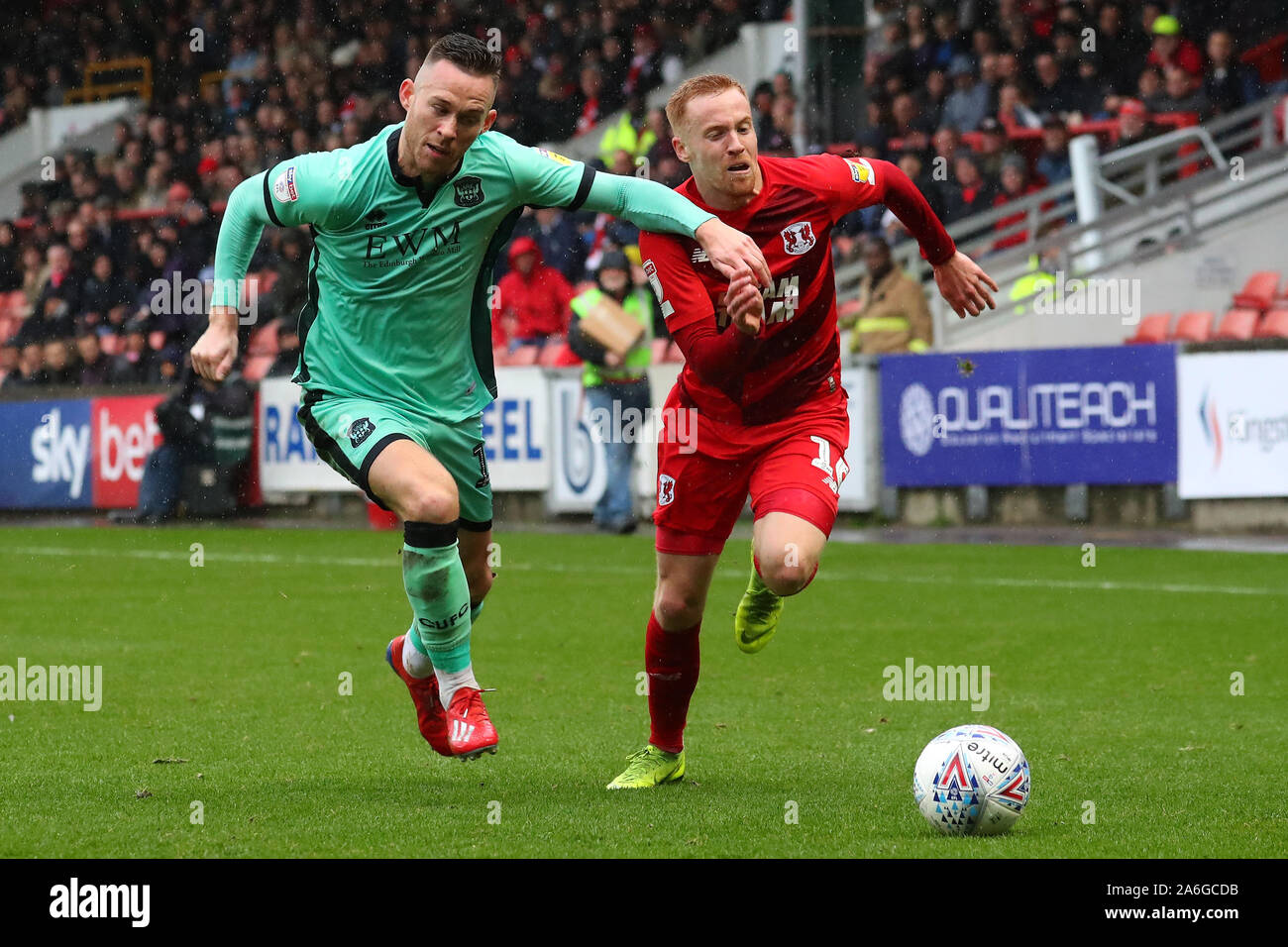 London, UK. 26th Oct, 2019. Carlisle's defender Gethin Jones and Orient's midfielder James Brophy compete for the ball during the EFL League Two match between Leyton Orient and Carlisle, at Brisbane Road, London, on 26 October 2019 Credit: Action Foto Sport/Alamy Live News Stock Photo
