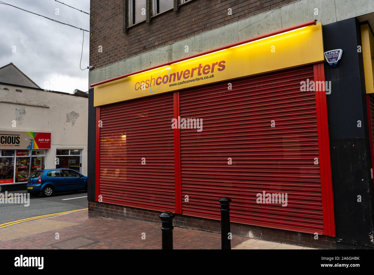 A very well secured and locked up Cash Converters shop, store in the Newcastle under Lyme, security facade Stock Photo