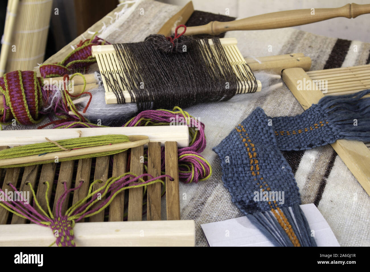 Spinners weaving ball wool, work and crafts, sewing Stock Photo
