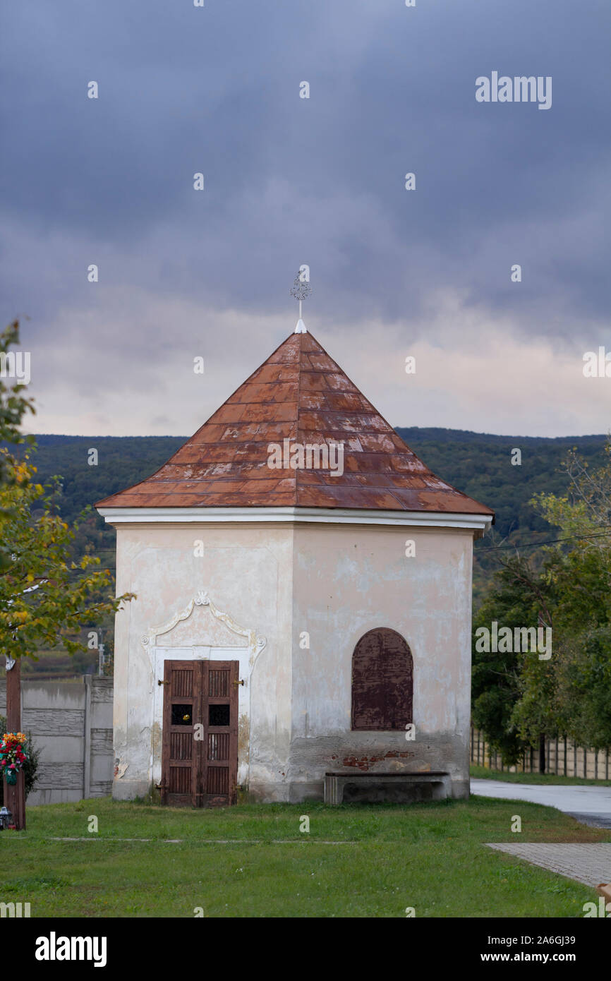 smal church or chapel with cloudy sky in background Stock Photo