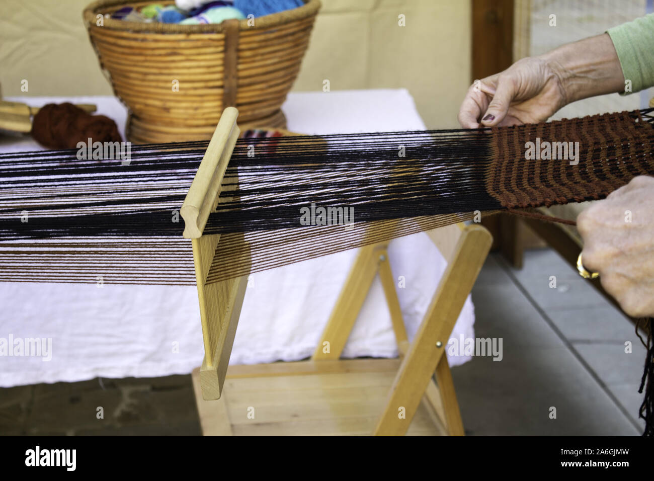Spinners weaving ball wool, work and crafts, sewing Stock Photo
