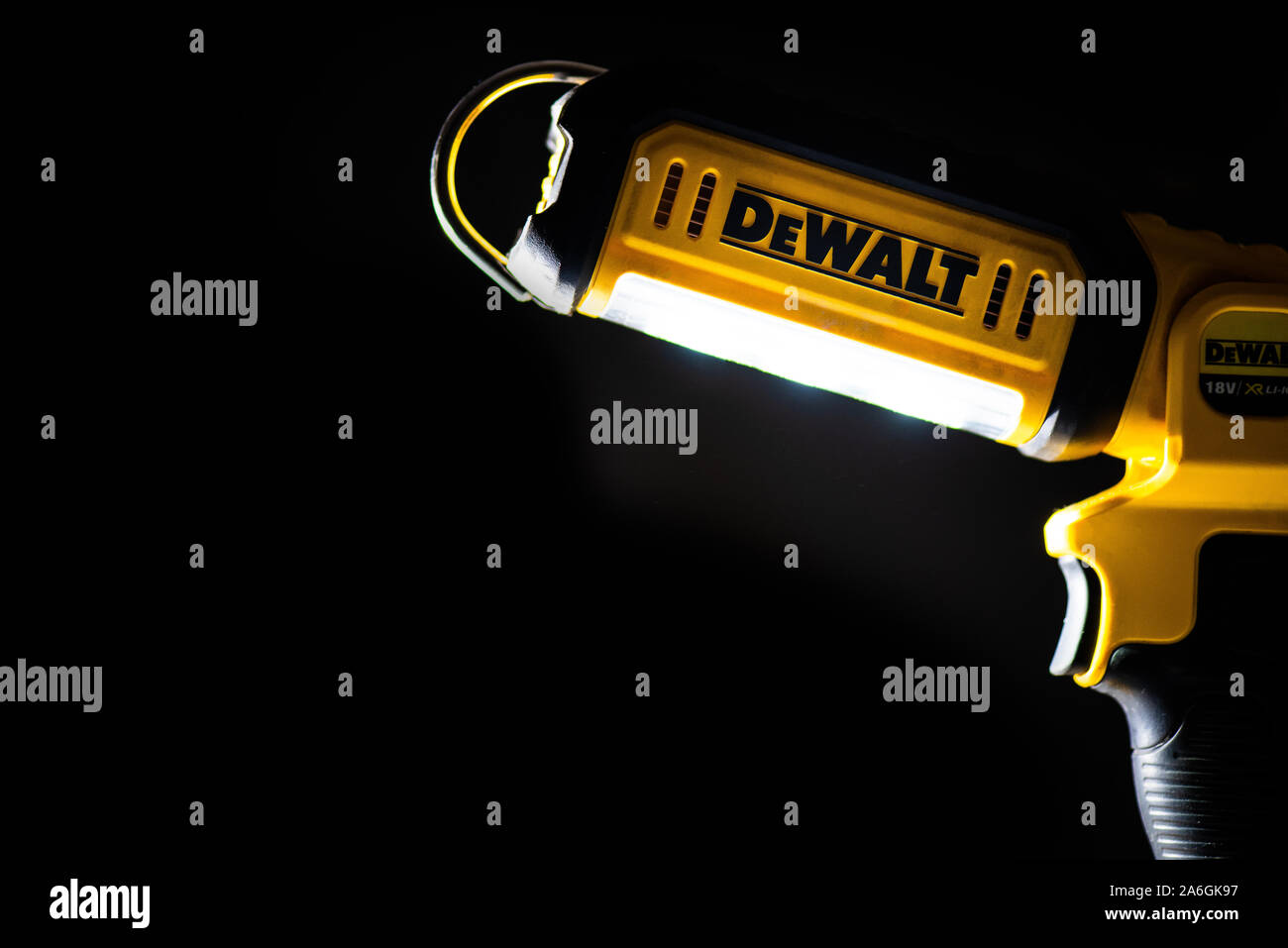 Dewalt cordless 18v LED flashlight, black background, battery operated Stock Photo