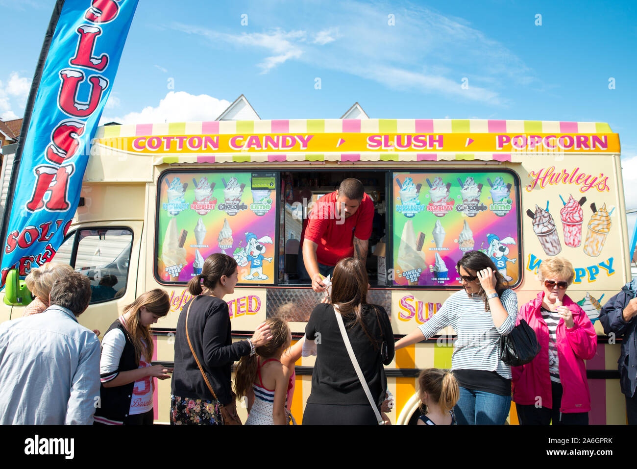 The annual Airshow by the sea, people queueing for ice creams to keep cool in the hot summer weather, Ice cream van Stock Photo