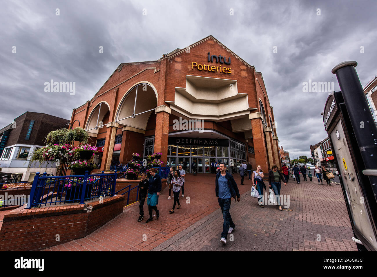 Shoppers walking outside the Intu Potteries Shopping Centre in Hanley