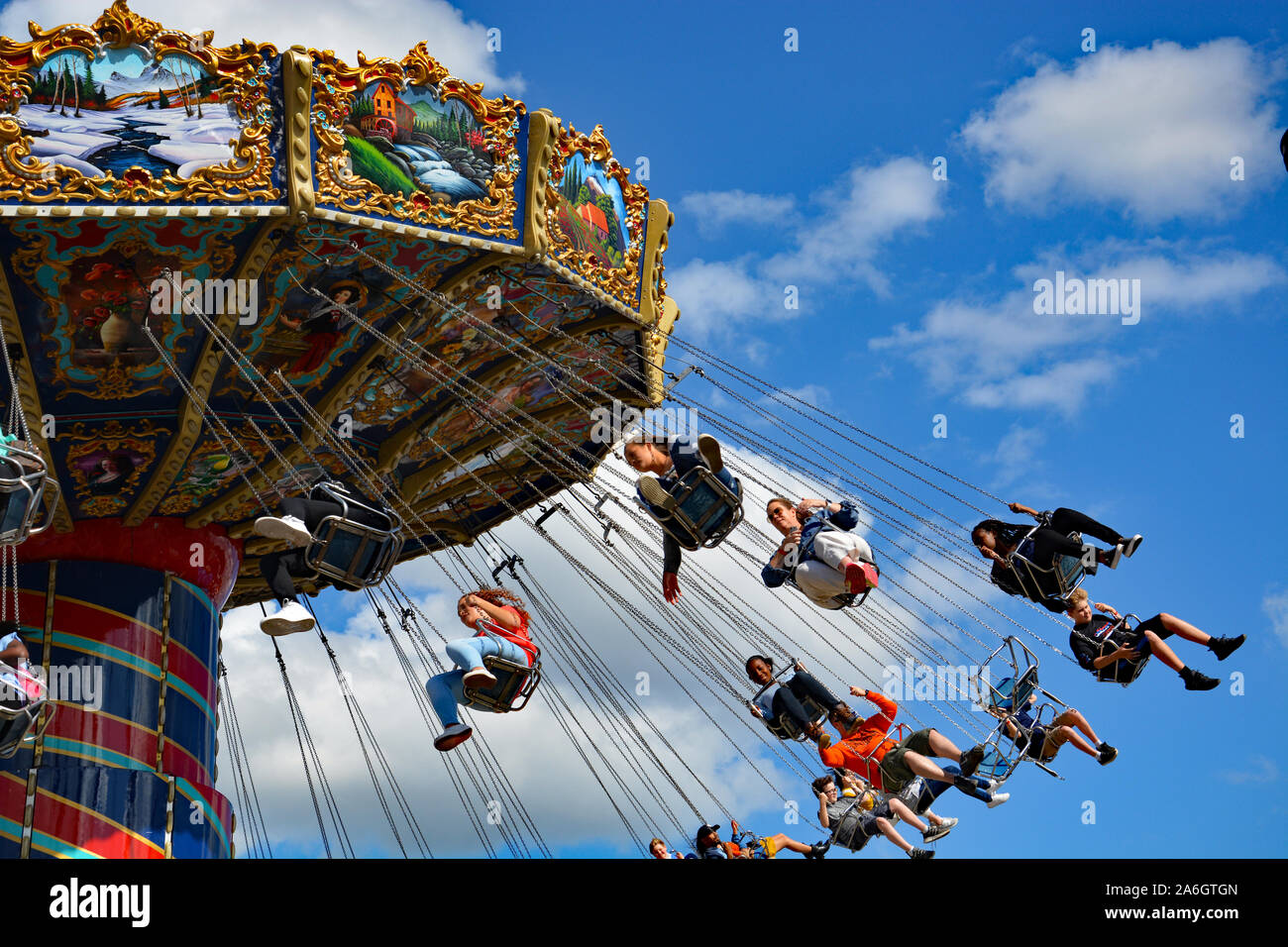 Close up of fair goers spinning on the Wave Swinger at the North Carolina State Fair in Raleigh. Stock Photo