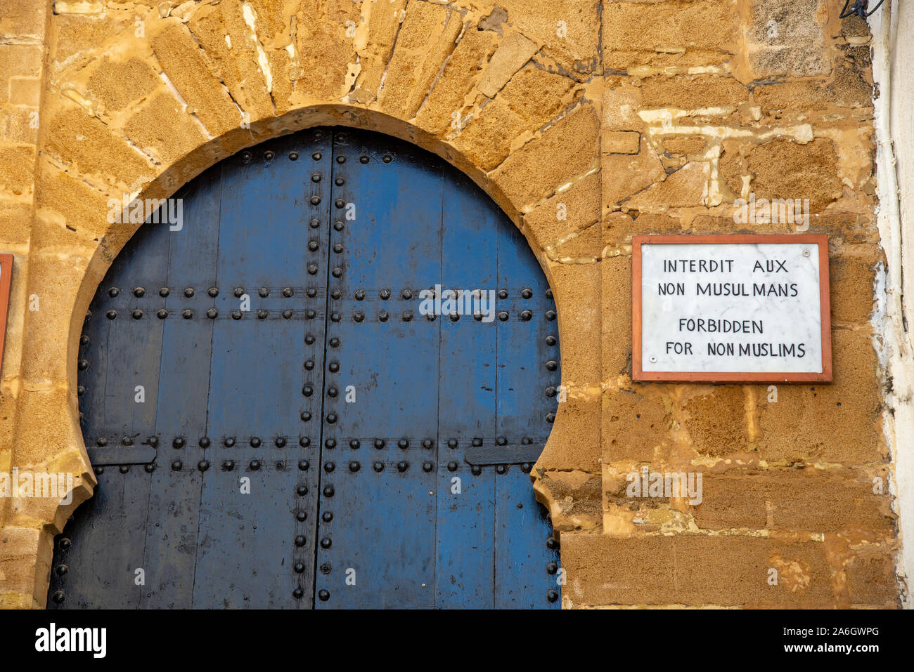 entrance of mosque with sign forbidden for nonmuslims in Rabat