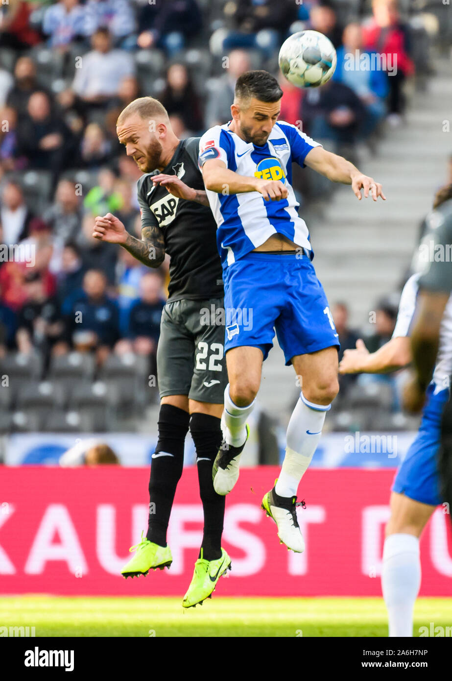 Berlin, Germany. 26th Oct, 2019. Vedad Ibisevic (R) of Hertha vies for header with Kevin Vogt of Hoffenheim during a German Bundesliga match between Hertha BSC and TSG 1899 Hoffenheim in Berlin, Germany, on Oct. 26, 2019. Credit: Kevin Voigt/Xinhua/Alamy Live News Stock Photo