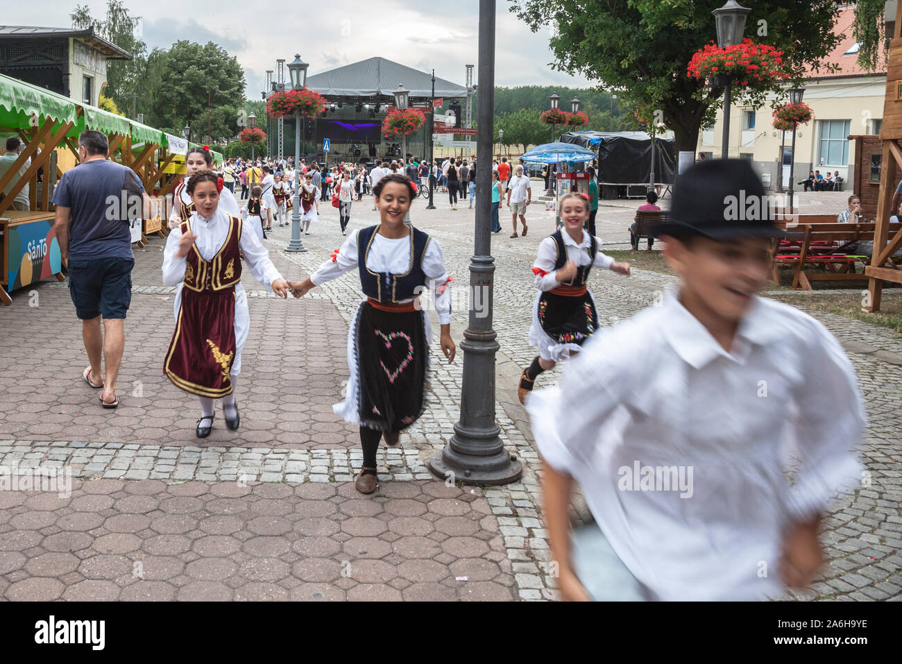 PANCEVO, SERBIA - JUNE 9, 2018: Serbian children wearing traditional folkloric costumes of Serbia with typical dresses for girls and peasant clothing Stock Photo