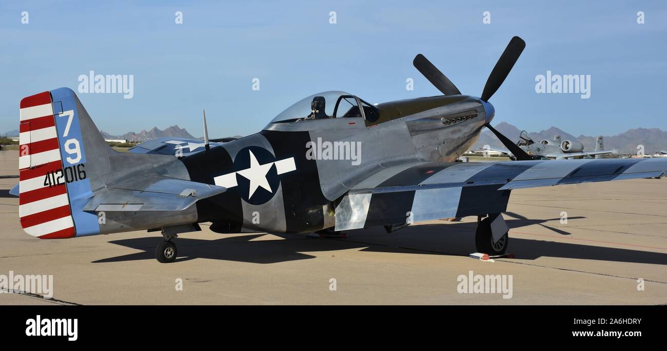 Tucson, USA - March 2, 2018: A vintage World War II-era P-51 Mustang fighter plane on the runway at Davis-Monthan Air Force Base in Tucson, Arizona. Stock Photo