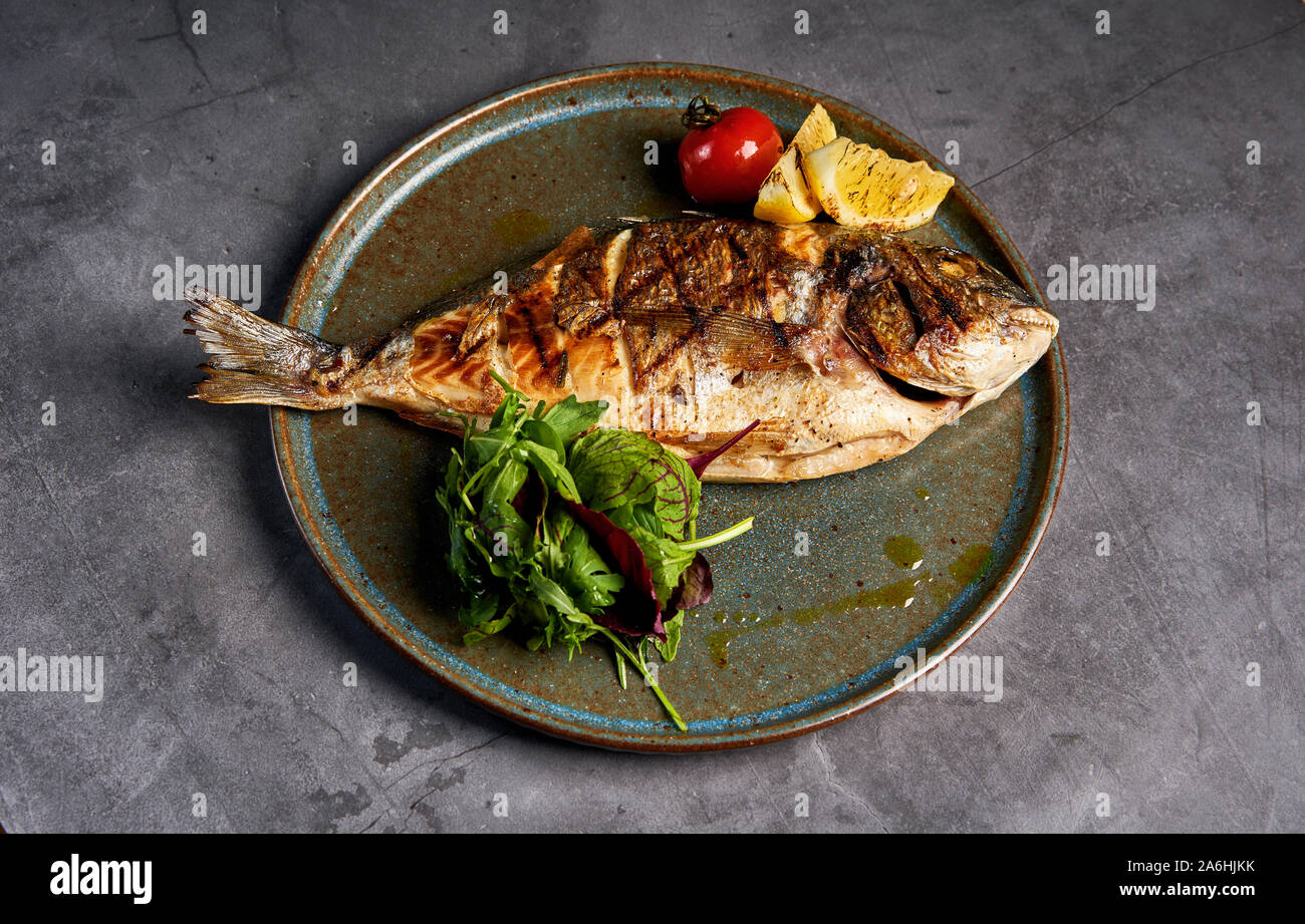 Fish Part Steak juicy fish steak on a plate Stock Photo - Alamy