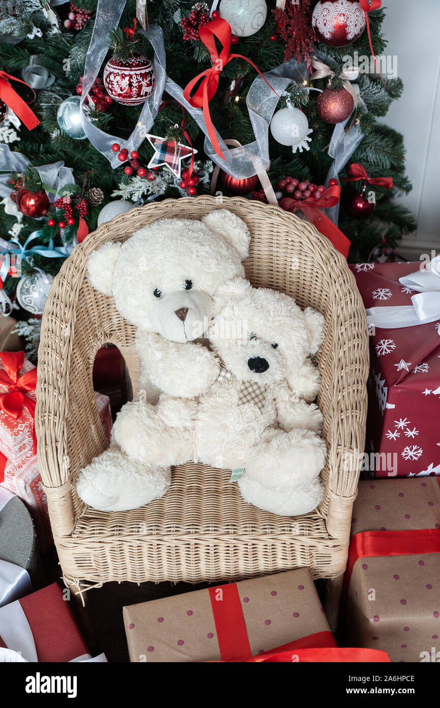 Christmas mood, Two white toy teddy bears against the background