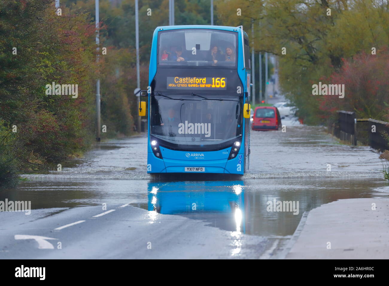 A bus drives through floodwater on Barnsdale Road between Castleford & Allerton Bywater after 24 hours of rainfall. Stock Photo