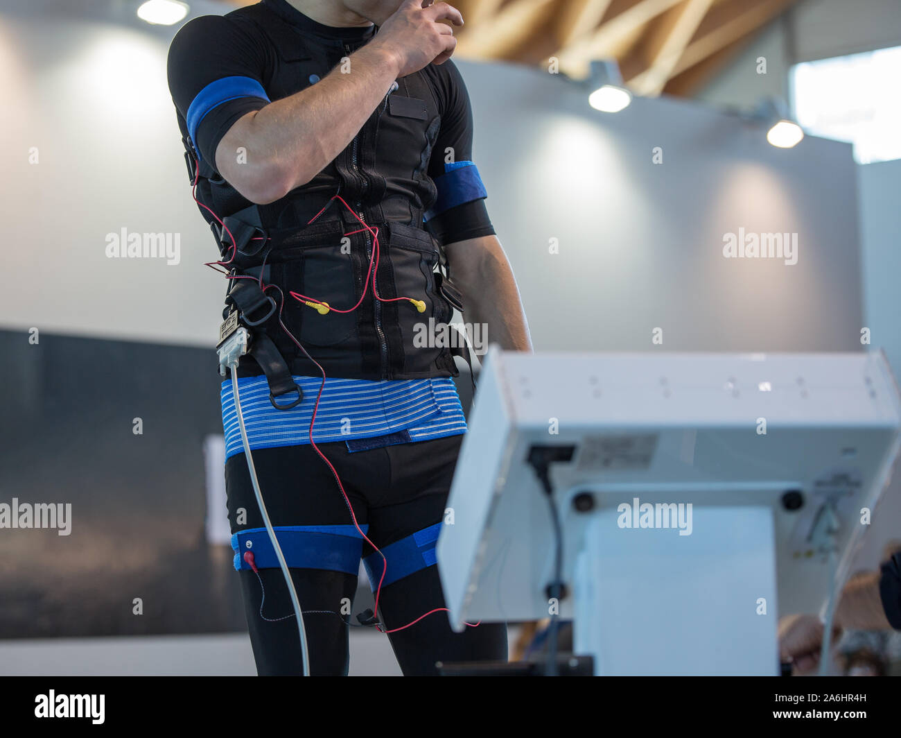 Boy Wearing Black Jacket with Electrode Muscular Electrostimulation