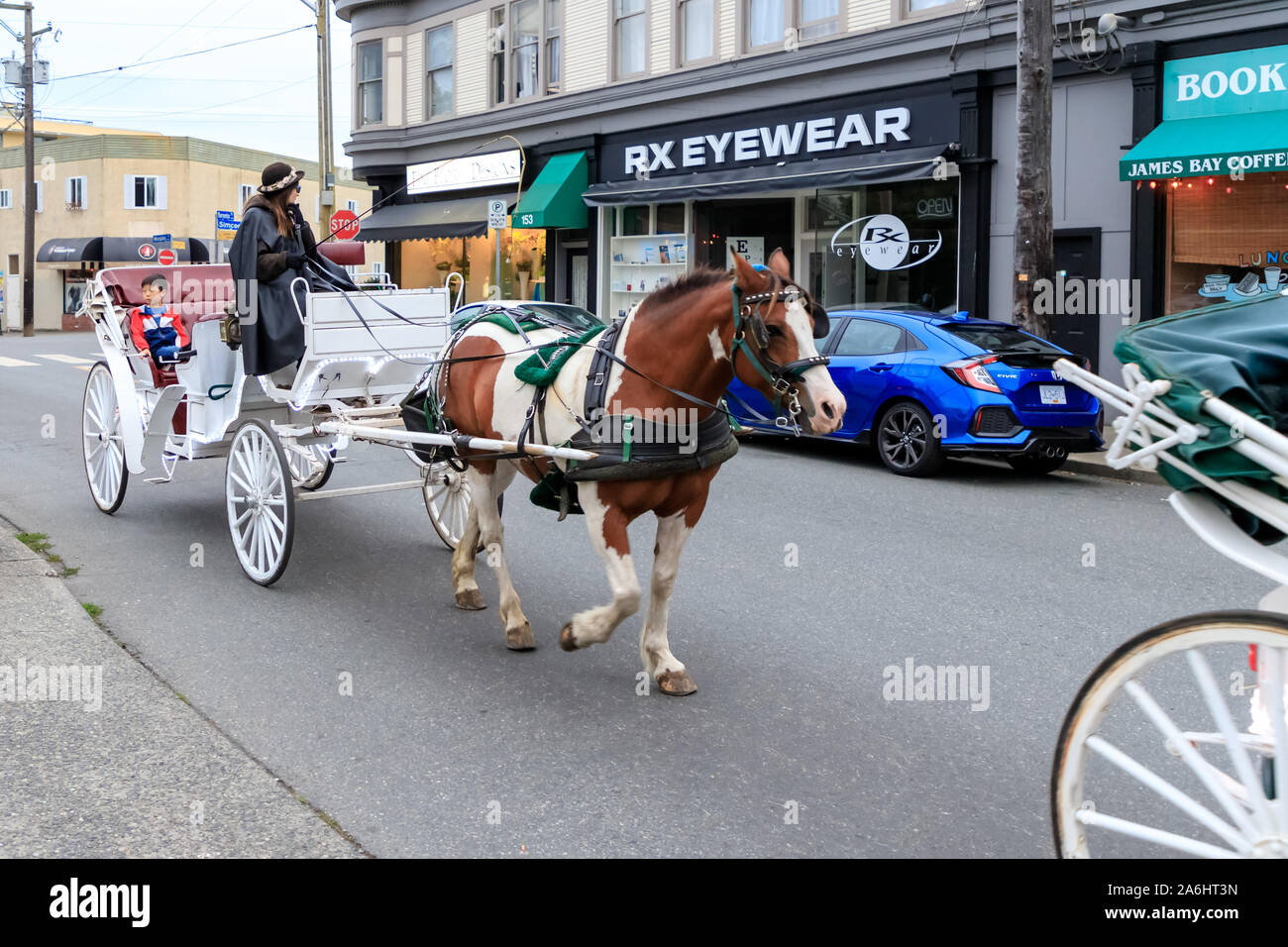 A horse drawn carriage, a familiar site in Victoria, British Columbia, Canada Stock Photo