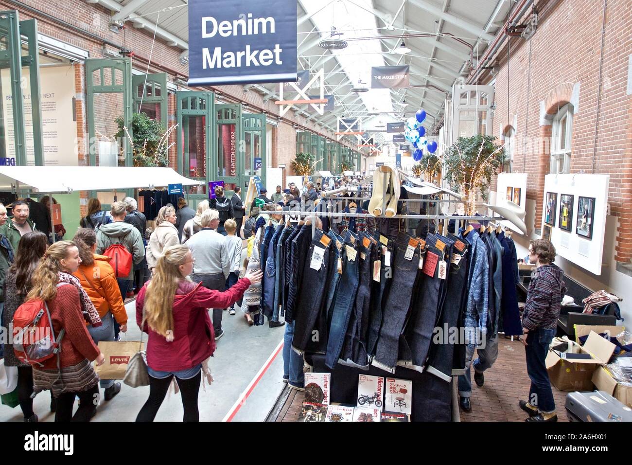 Amsterdam, Netherlands. 26th Oct, 2019. Visitors view jeans during the Amsterdam  Denim Days in Amsterdam, the Netherlands, Oct. 26, 2019. The Amsterdam Denim  Days 2019 was held from Oct. 22-27 in the