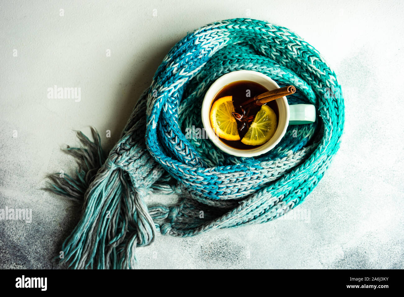 Mulled tea with lemon and spices on stone table with copy space Stock ...