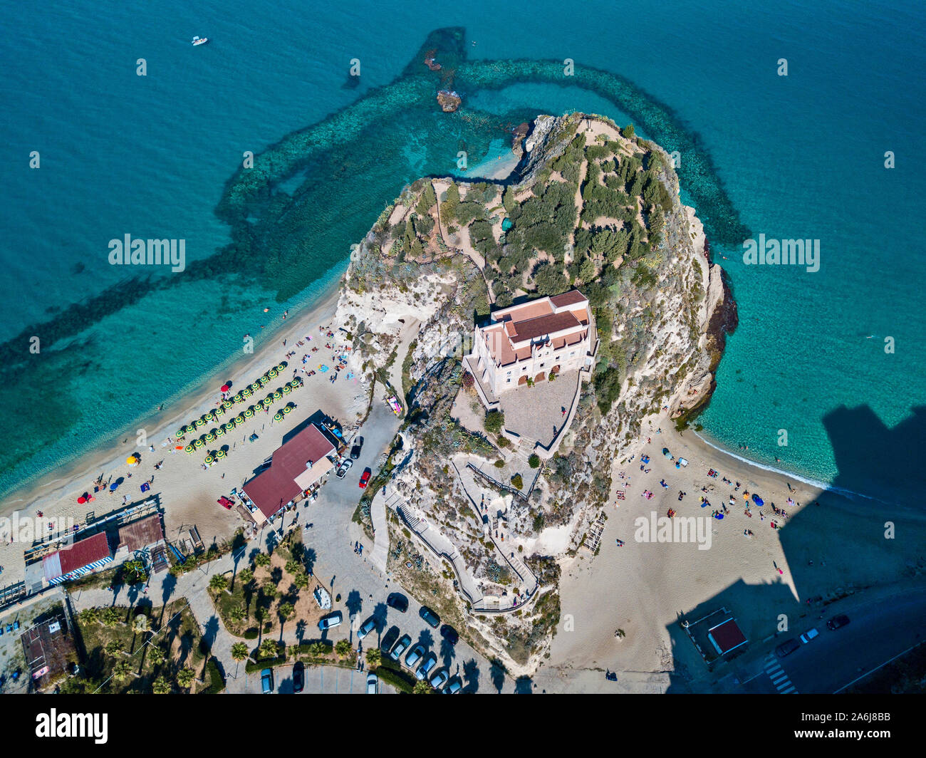Aerial view of Tropea, house on the rock and Sanctuary of Santa Maria dell'Isola, Calabria. Italy. Tourist destinations. A cliff and a beach Stock Photo