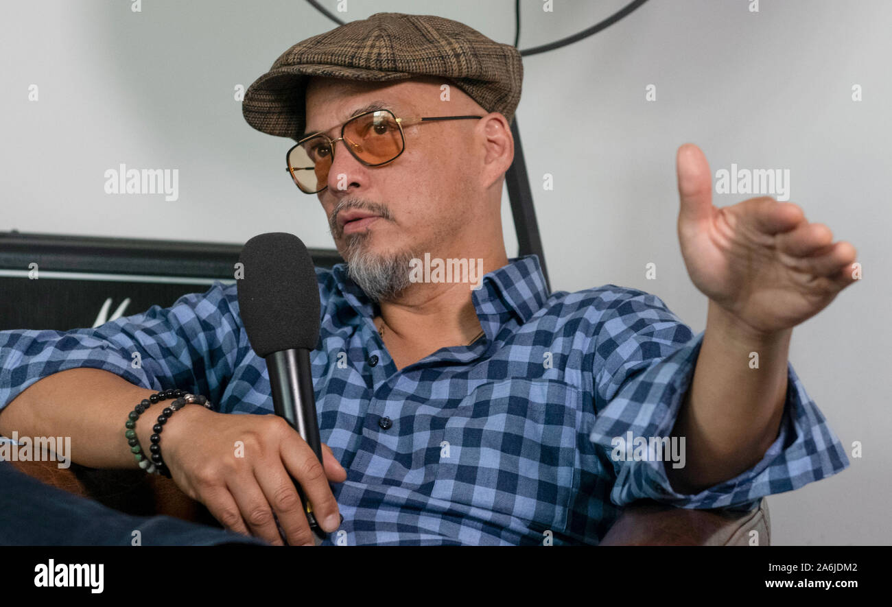 Berlin, Germany. 19th June, 2019. Joey Santiago, guitarist of the US-American band Pixies, speaks during an interview. Credit: Paul Zinken/dpa/Alamy Live News Stock Photo