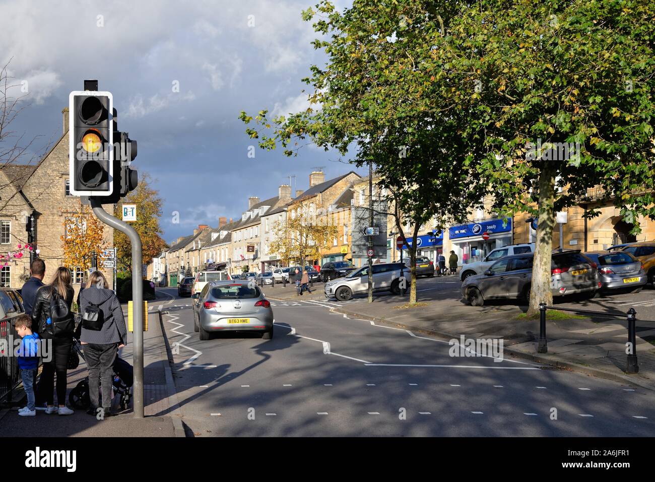 The High Street in Chipping Norton on a sunny autumnal day West Oxfordshire Cotswold Hills England UK Stock Photo