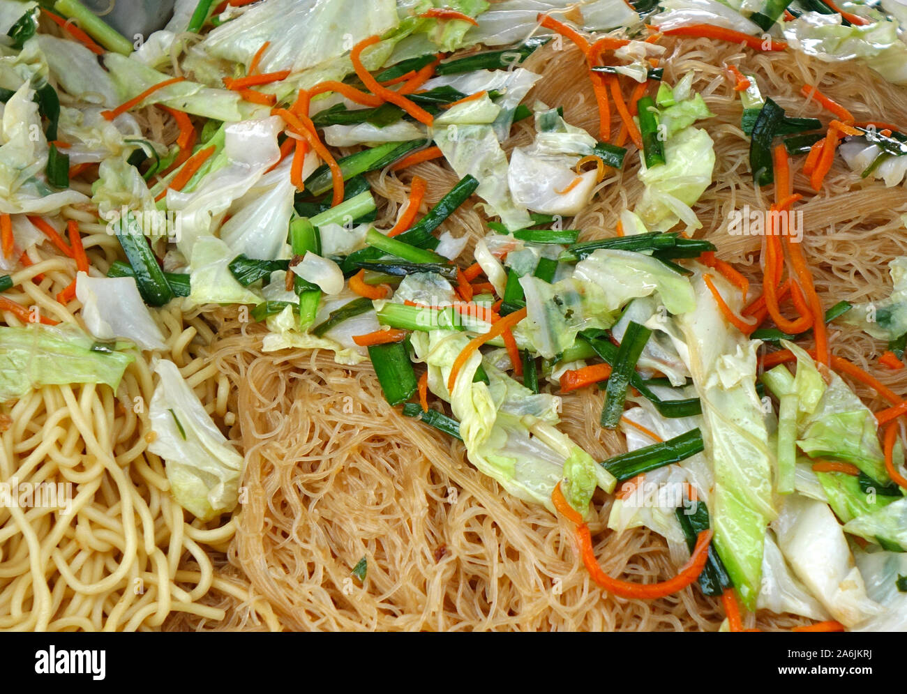 Chinese fried noodles with cabbage, chives and carrots Stock Photo Alamy
