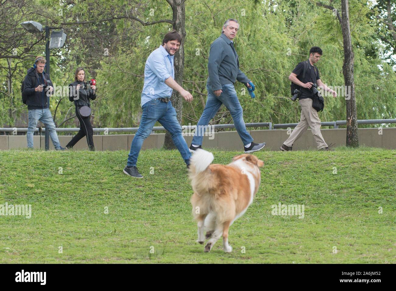 Buenos Aires, Buenos Aires, Argentina. 27th Oct, 2019. Frente de Todos  presidential candidate ALBERTO FERNANDEZ walks his dog, Dylan, prior to  casting his vote at a polling station in Buenos Aires, Argentina,