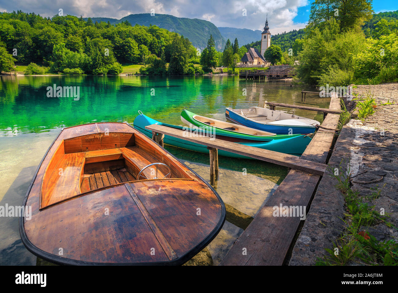 Beautiful travel and touristic location. Colorful canoes and boats