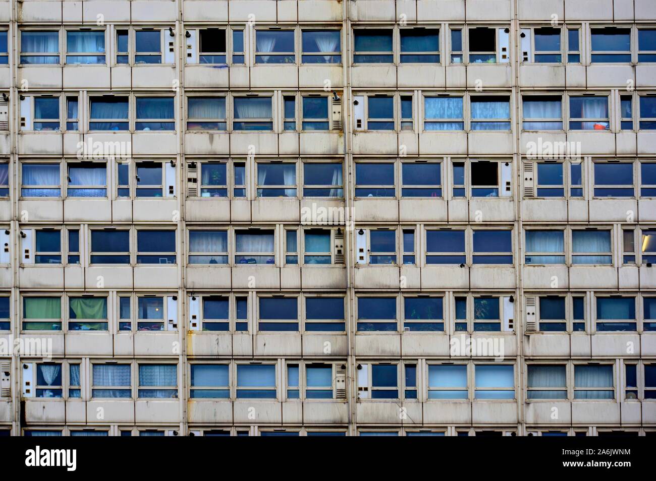 Deptford, London, United Kingdom - October 12, 2019: White facade of poor quality social housing apartment block Stock Photo