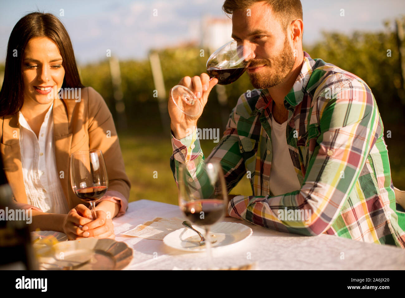 Young man sitting picnic table hi-res stock photography and images - Alamy